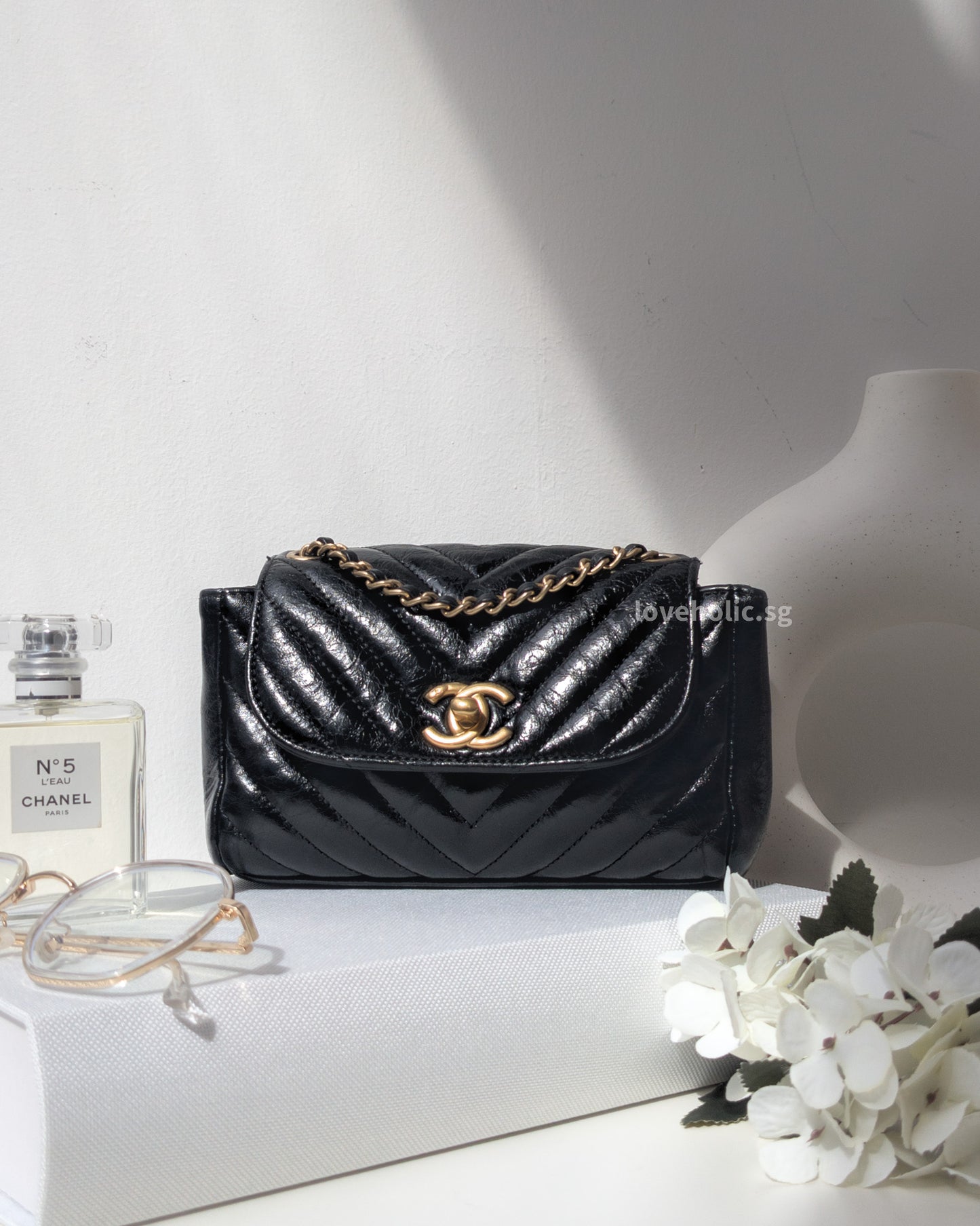 Chanel Classic Flap Chervon Small | Black Aged Lambskin Brushed Gold Hardware