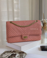 Chanel Reissue 2.55 226 Medium | Sakura Pink Calfskin Brushed Gold Hardware-front