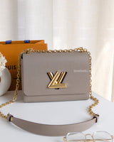 Louis Vuitton Twist MM | Grey Leather Gold Hardware-front