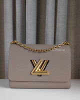 Louis Vuitton Twist MM | Grey Leather Gold Hardware-front1