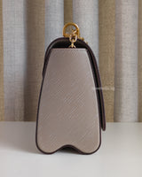 Louis Vuitton Twist MM | Grey Leather Gold Hardware-side