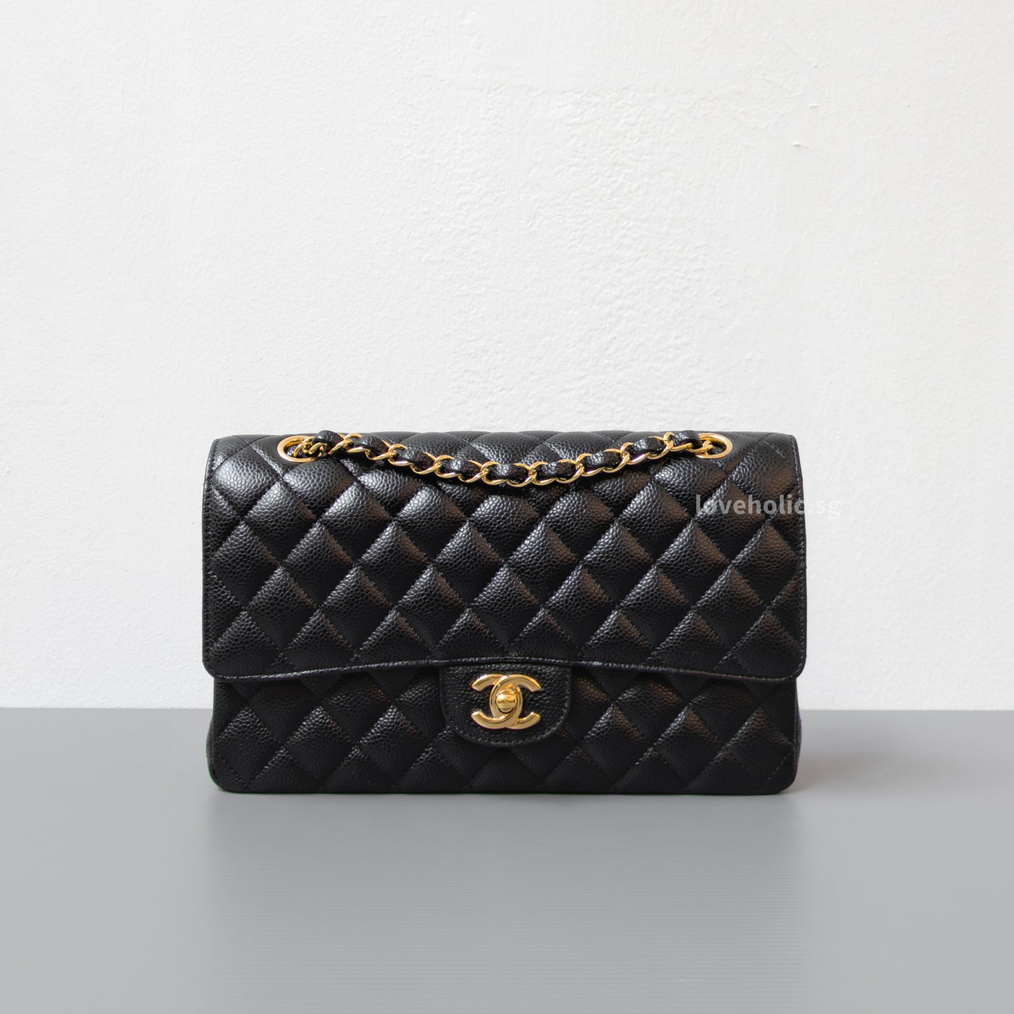 Chanel Classic Flap Medium | Black Caviar Gold Hardware-front1