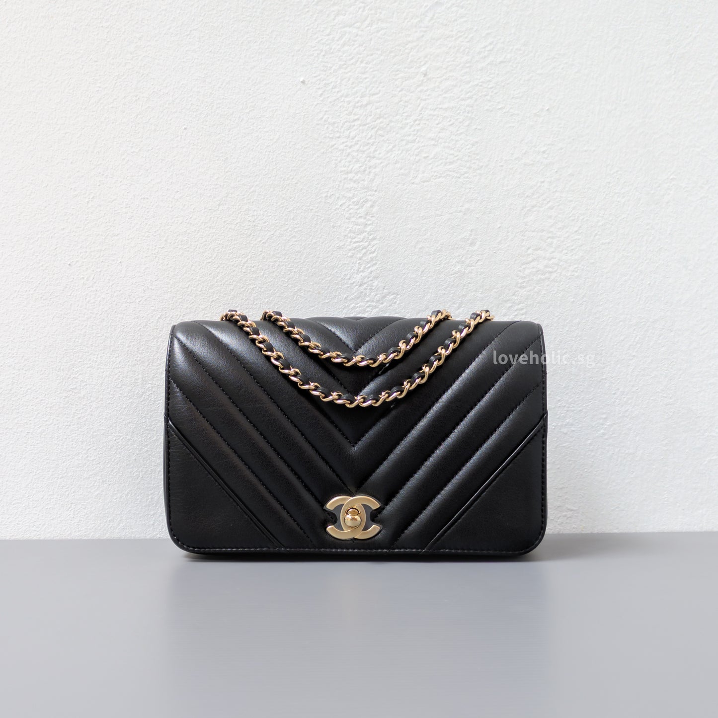 Chanel Statement Flap Bag Chevron Mini | Black Lambskin Light Gold Hardware-front1