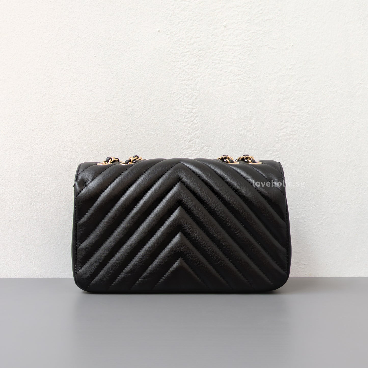 Chanel Statement Flap Bag Chevron Mini | Black Lambskin Light Gold Hardware-back