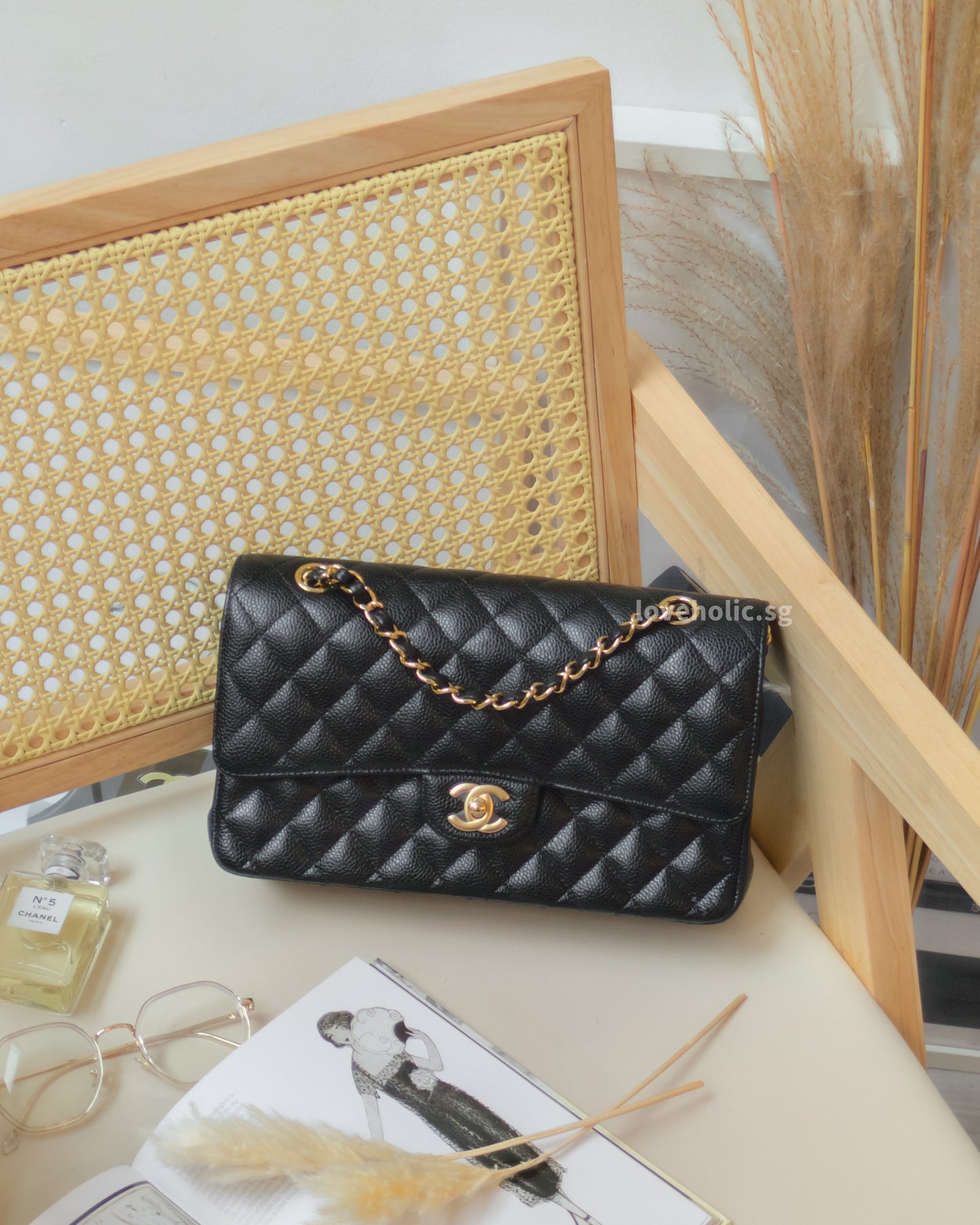 Chanel Classic Flap Medium | Black Caviar Gold Hardware-front
