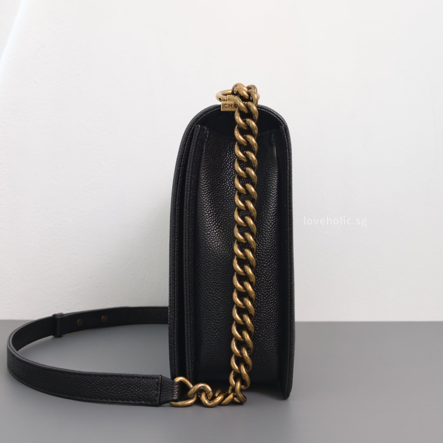 Chanel Boy Large | Black Caviar Brushed Gold Hardware-side