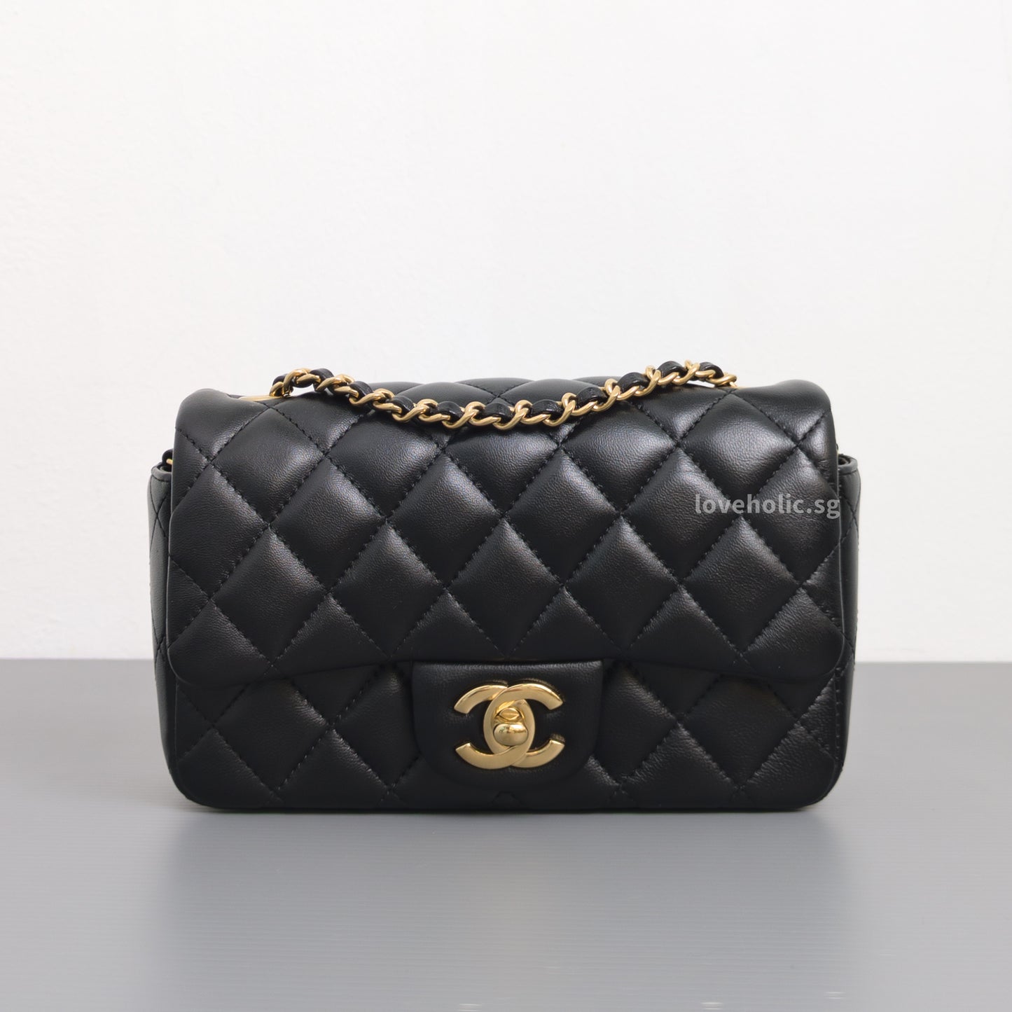Chanel Mini Flap Bag 24K Black Lambskin Light Gold Hardware-front1