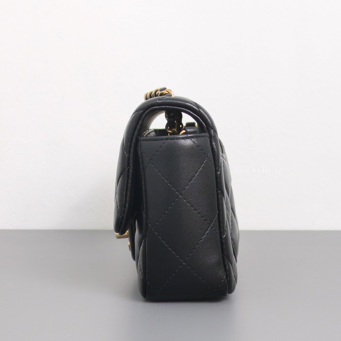 Chanel Mini Flap Bag 24K Black Lambskin Light Gold Hardware-side