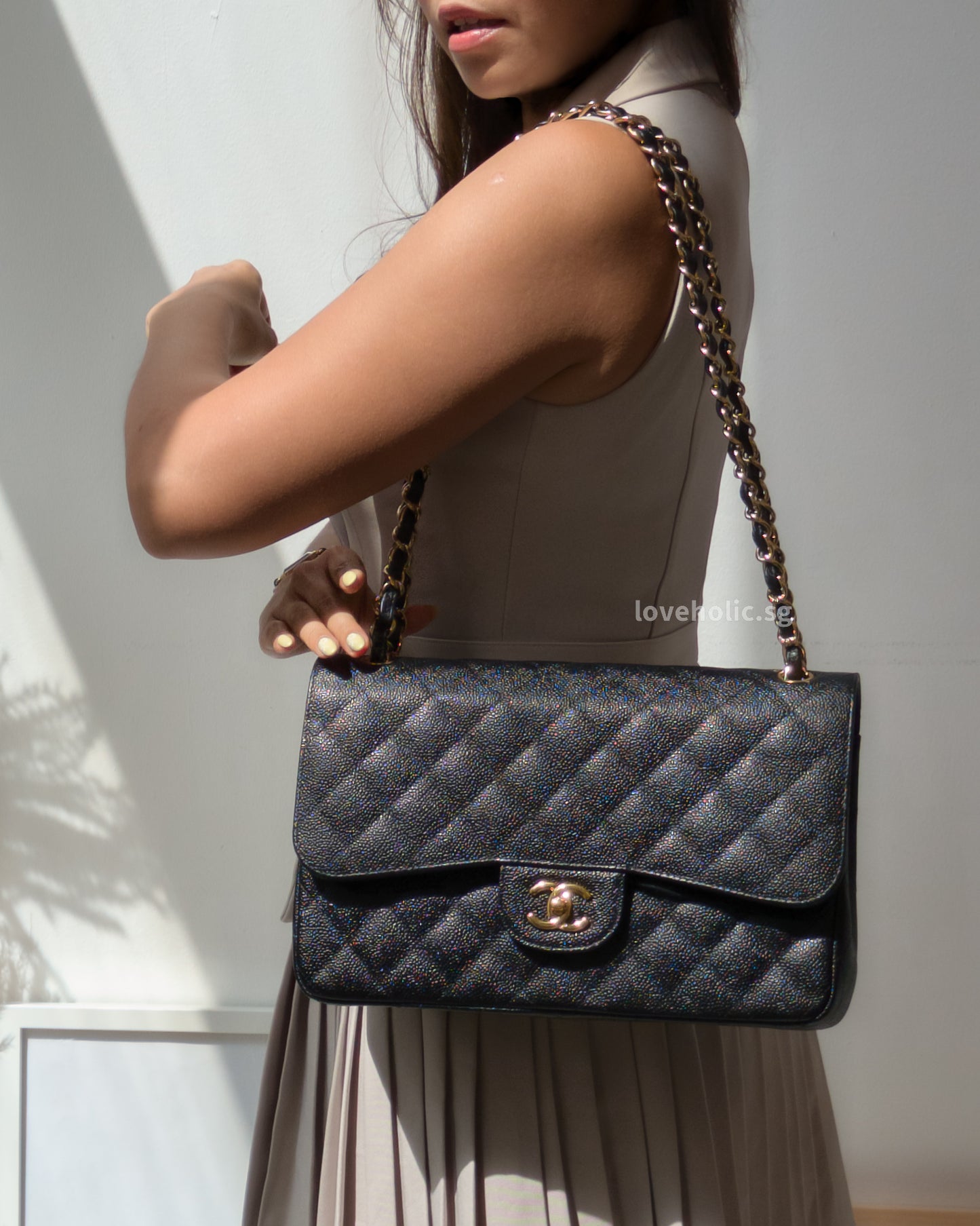 Chanel Classic Flap Jumbo | Black Caviar Gold Hardware-model