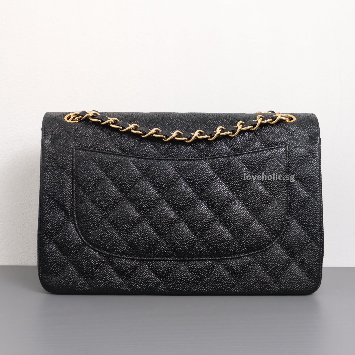 Chanel Classic Flap Jumbo | Black Caviar Gold Hardware-side