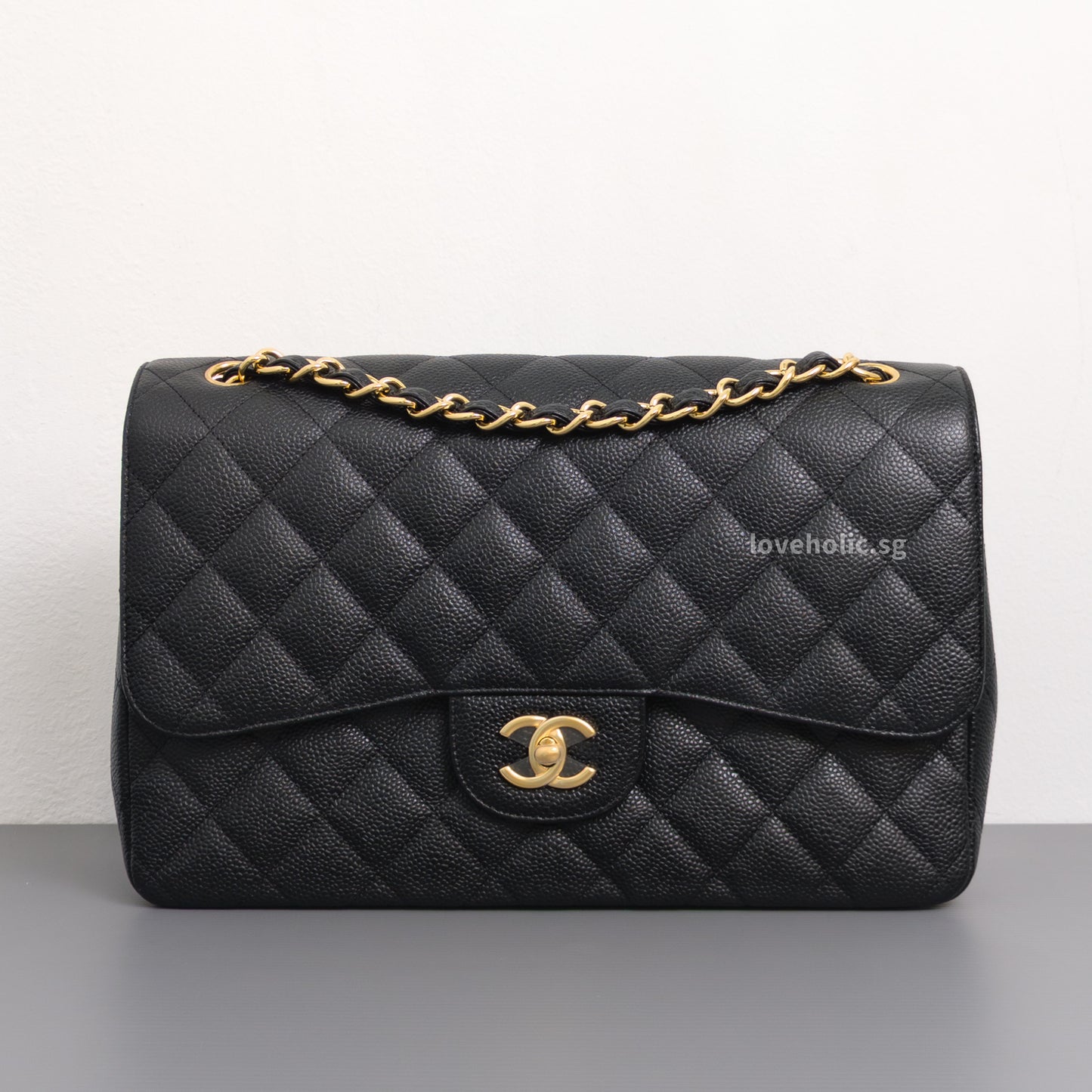 Chanel Classic Flap Jumbo | Black Caviar Gold Hardware-front1