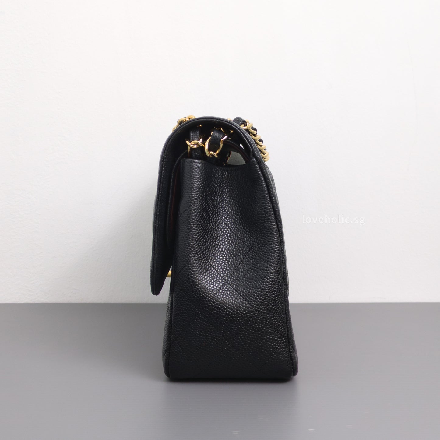 Chanel Classic Flap Jumbo | Black Caviar Gold Hardware-side
