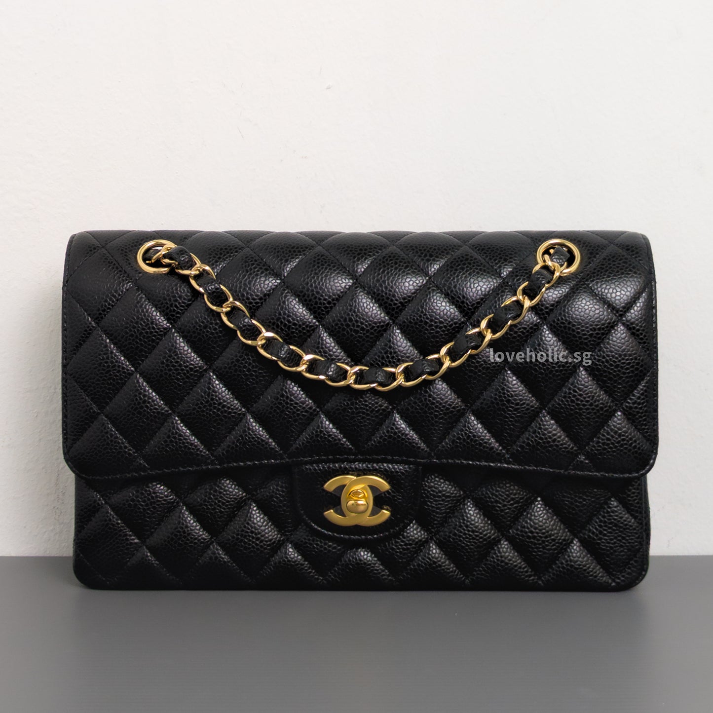 Chanel Classic Flap Medium | Black Caviar Gold Hardware-front1