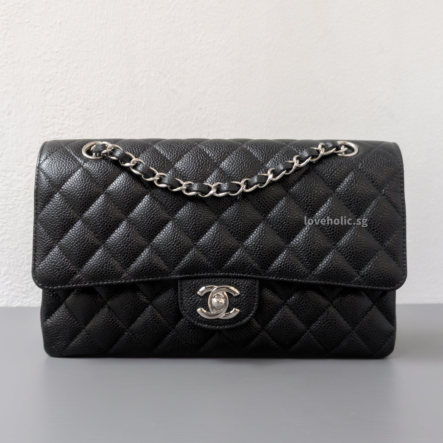 Chanel Classic Flap Medium | Black Caviar Silver Hardware-front1