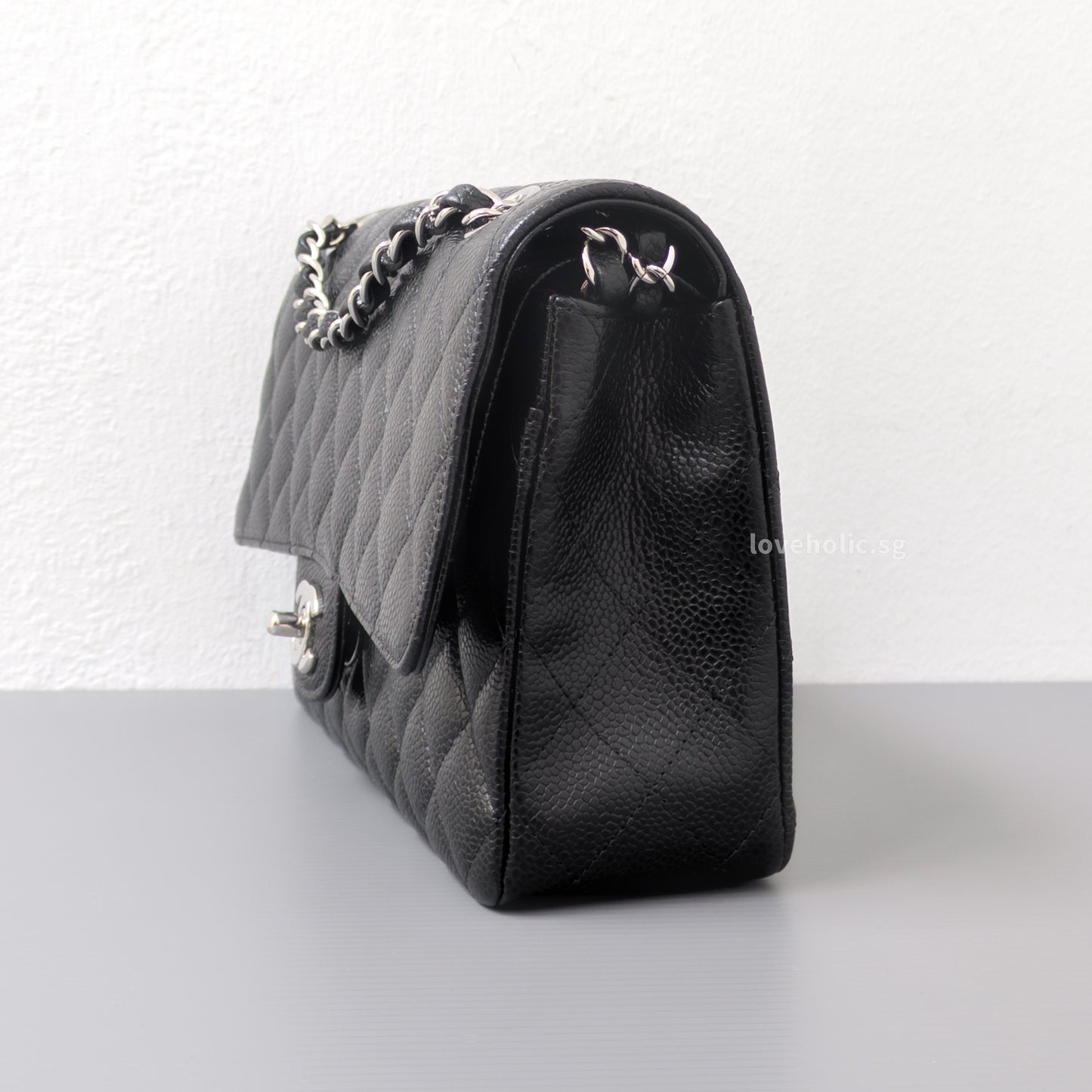 Chanel Classic Flap Medium | Black Caviar Silver Hardware-side