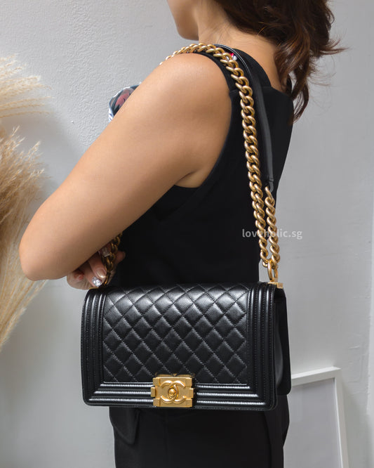 Chanel Boy Old Medium | Black Caviar Brushed Gold Hardware-model
