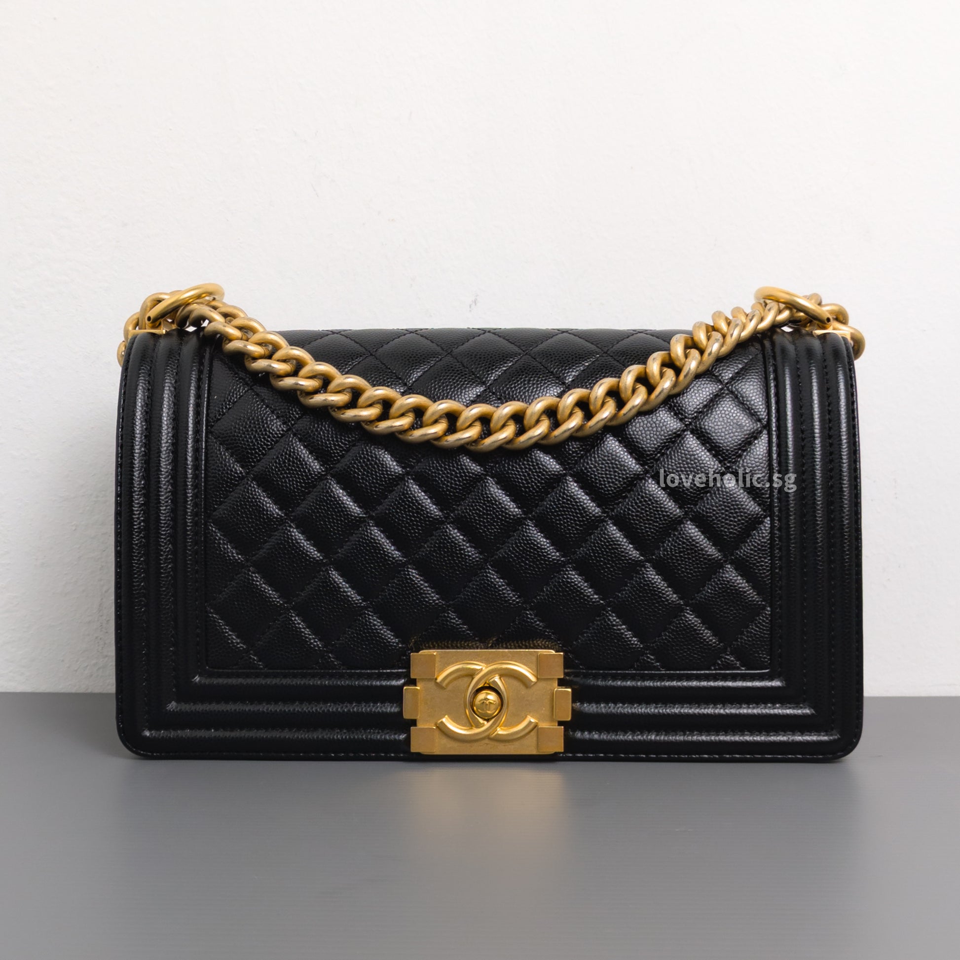 Chanel Boy Old Medium | Black Caviar Brushed Gold Hardware-front1