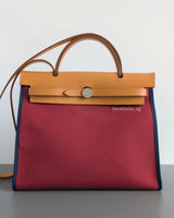 Hermes Herbag 31 Tilt Toile Officier/ Vache Hunter | Ruby/ Malta Blue Palladium Hardware-front1
