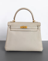 Kelly Retourne 25 | Beton Togo Gold Hardware