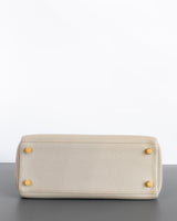 Kelly Retourne 25 | Beton Togo Gold Hardware