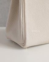 Kelly Retourne 25 | Beton Togo Gold Hardware