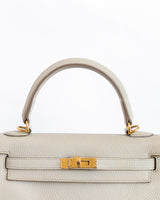 Kelly Retourne 25 | Beton Togo Gold Hardware