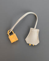 Kelly Retourne 25 | Beton Togo Gold Hardware