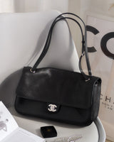 Chanel Maxi Flap 32cm | Black Caviar Silver Hardware-front
