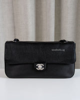 Chanel Maxi Flap 32cm | Black Caviar Silver Hardware-front1