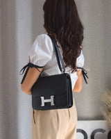 Hermes Constance 24 | Black Epsom Palladium Hardware-model