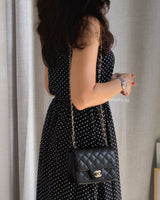 Chanel Classic Flap Mini Square | Black Caviar Light Gold Hardware-model