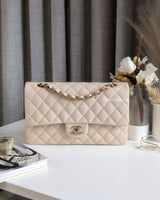 Chanel Classic Flap Medium | Beige Caviar Light Gold Hardware-front