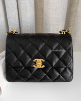 Chanel Mini Flap Bag | Black Caviar Gold Hardware-front1