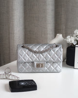 Chanel Reissue 2.55 21A Mini | Metallic Silver Calfskin Ruthenium Hardware-front