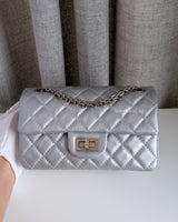 Chanel Reissue 2.55 21A Mini | Metallic Silver Calfskin Ruthenium Hardware-front1