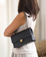 Chanel Classic Flap Medium | Black Caviar Gold Hardware-model