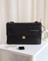 Chanel Maxi Flap 38cm | 26S Black Caviar Gold Hardware-front