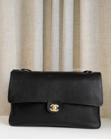 Chanel Maxi Flap 38cm | 26S Black Caviar Gold Hardware-front1