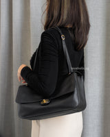 Chanel Maxi Flap 32cm | 26A Black Caviar Gold Hardware-model