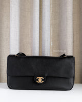 Chanel Maxi Flap 32cm | 26A Black Caviar Gold Hardware-front1