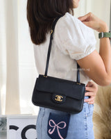 Chanel Maxi Flap Mini | 26B Black Caviar Gold Hardware-model