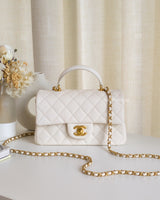 Chanel Mini Rectangle with Top Handle 21S Ivory Caviar Brushed Gold Hardware-front