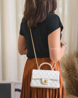 Chanel Mini Rectangle with Top Handle 21S Ivory Caviar Brushed Gold Hardware-model