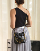 Chanel 22 Bag Mini | Black Lambskin Brushed Gold Hardware-model
