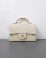Chanel Mini Rectangle with Top Handle 21S Ivory White Caviar Brushed Gold Hardware-front1