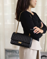 Chanel Reissue 2.55 Small | Black Aged Calfskin Brushed Gold Hardware-model