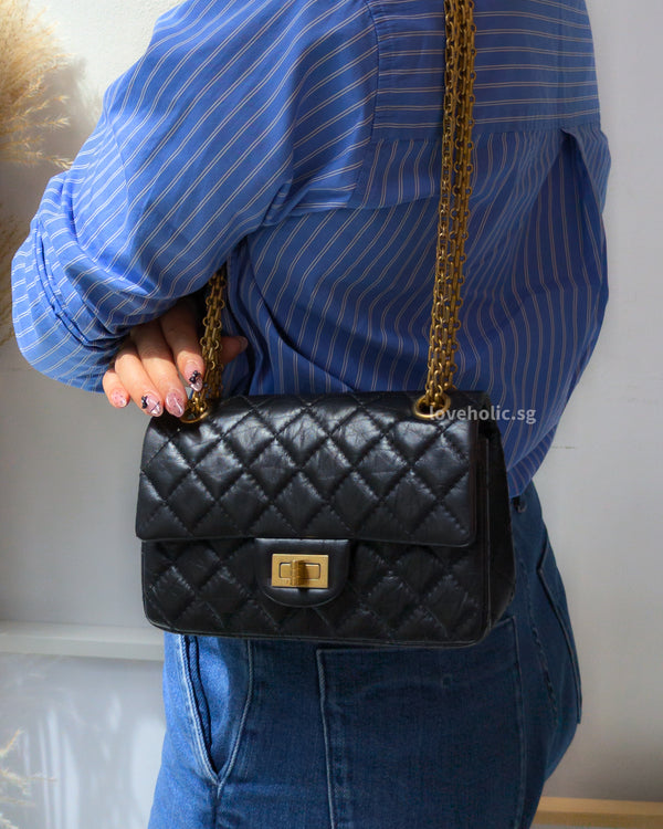 Chanel Reissue 2.55 Mini | Black Calfskin Brushed Gold Hardware-model