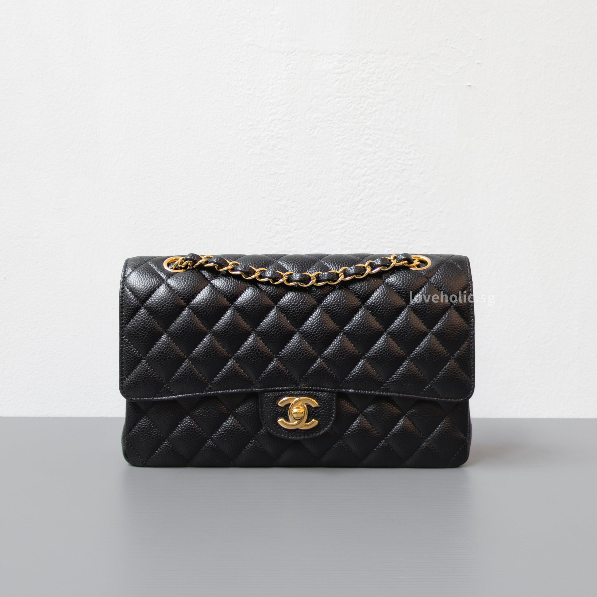 Chanel Classic Flap Medium | Black Caviar Gold Hardware-front1