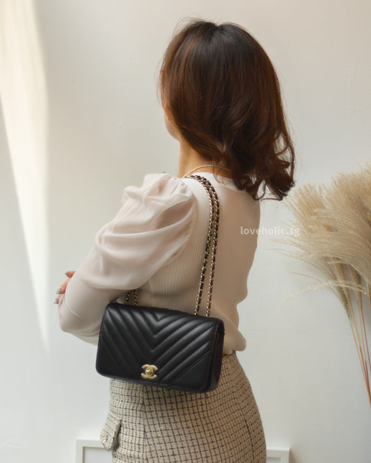 Chanel Statement Flap Bag Chevron Mini | Black Lambskin Light Gold Hardware-model