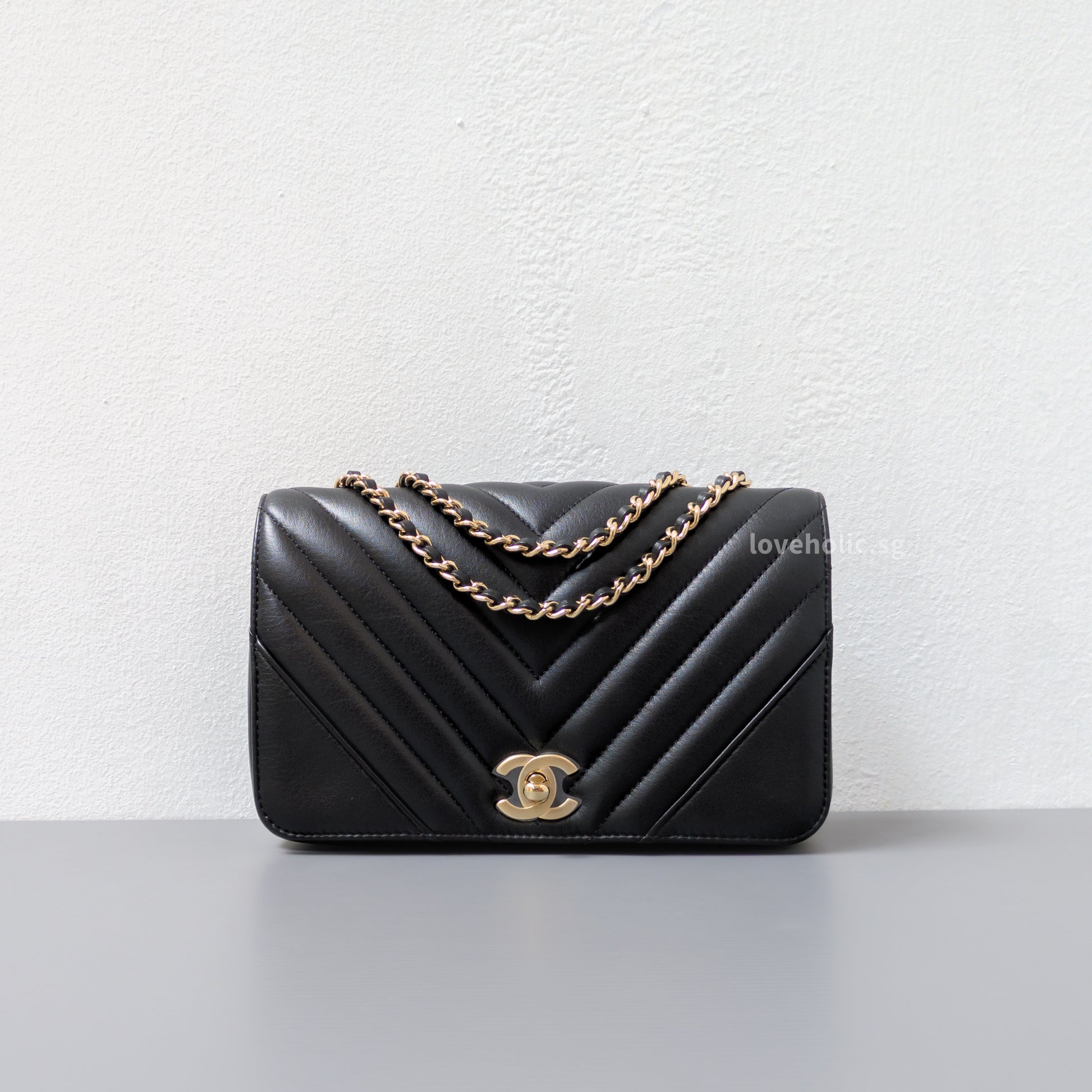 Chanel Statement Flap Bag Chevron Mini | Black Lambskin Light Gold Hardware-front1